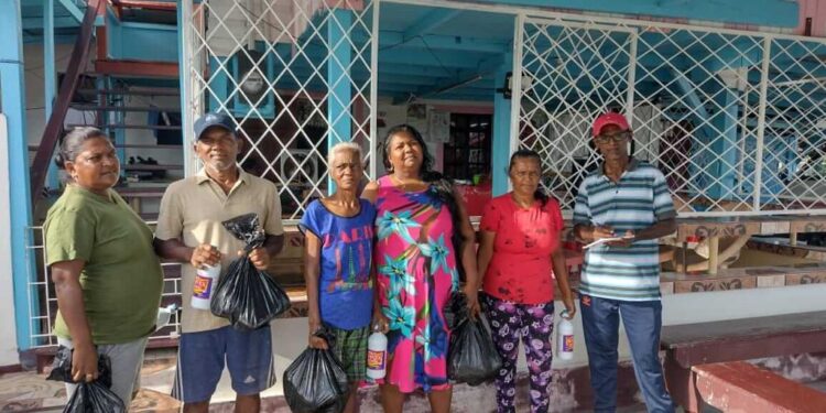 CDC distributes cleaning supplies to flood-affected residents.