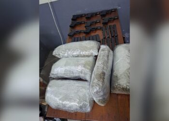 Eight 9mm Firearms, 11.2 lbs of suspected Marijuana found in barrel shipped from NY