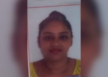 Female accountant found dead with knife stuck in neck