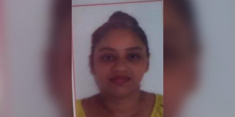 Female accountant found dead with knife stuck in neck