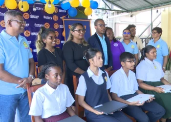 Four students get laptops from Corriverton Rotary Club