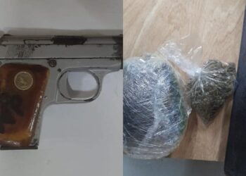 Gun and marijuan found during house raid in New Amsterdam.